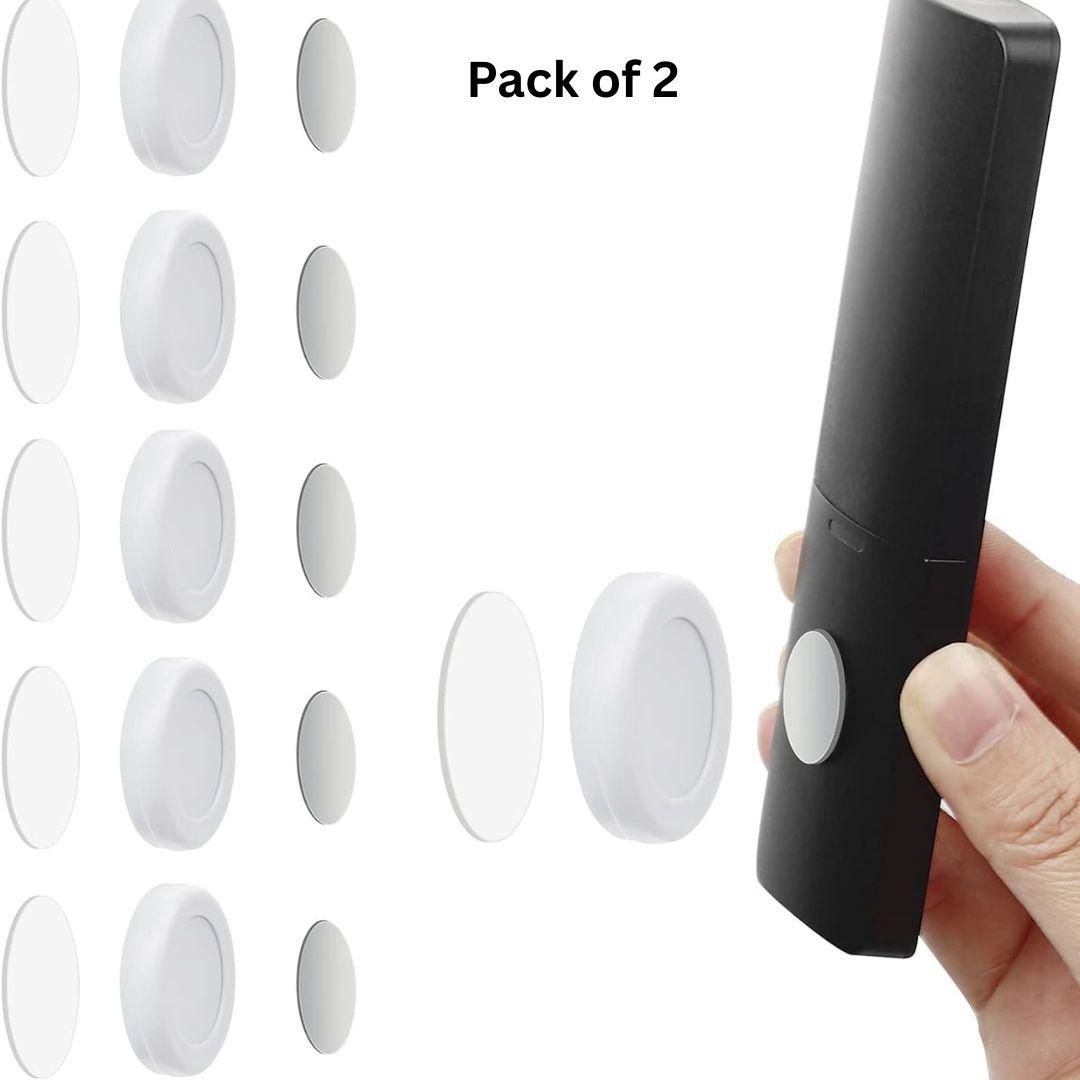 Black remote control with white circular objects and 'Pack of 2' text on a white background