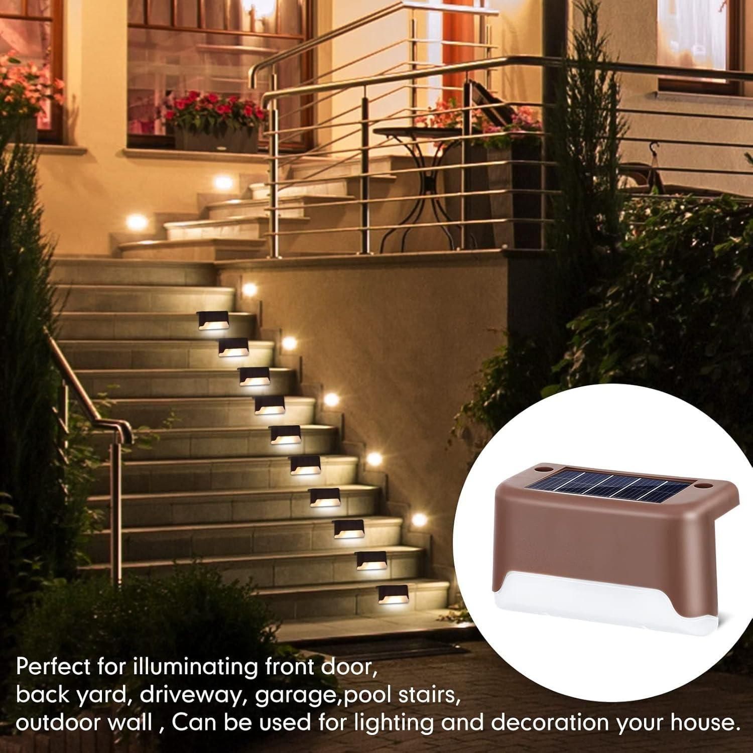Solar-powered outdoor lights illuminating a staircase with an inset of the solar panel.