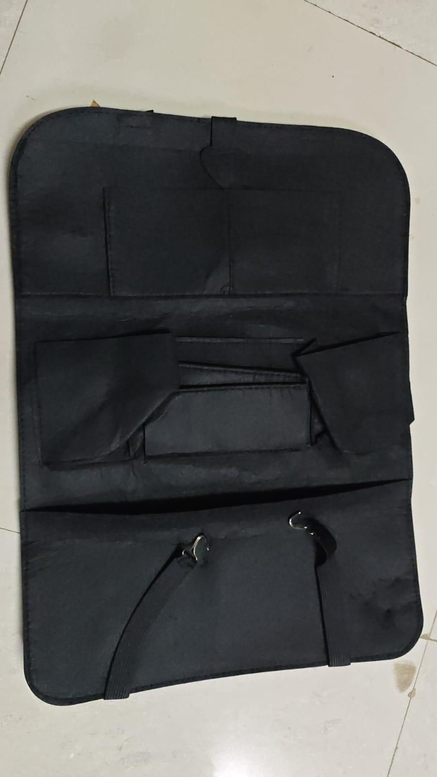 Black bag on a light-colored floor